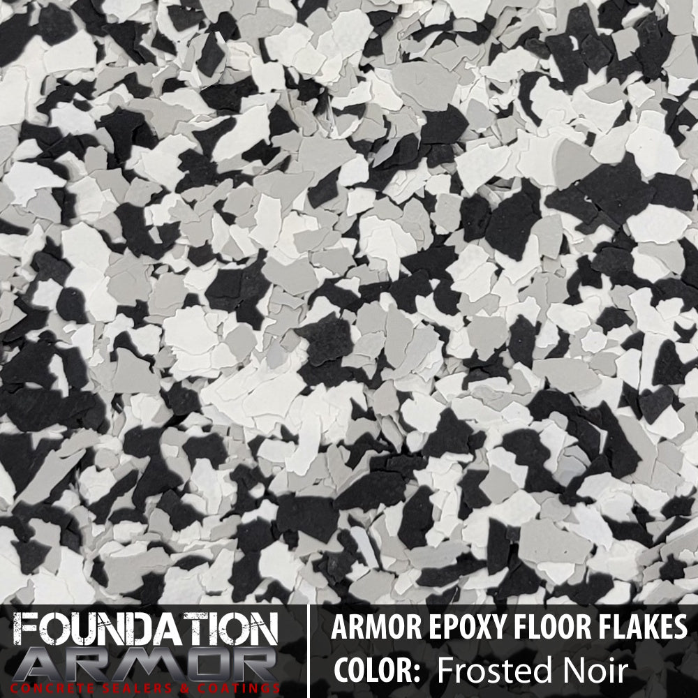 Frosted noir epoxy floor flakes from Epoxy Floor Flakes, showcasing textured, decorative black and gray epoxy coating for floors.