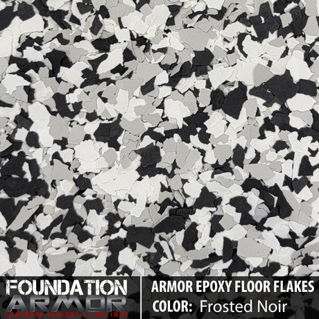 Frosted noir epoxy floor flakes from Epoxy Floor Flakes, showcasing textured, decorative black and gray epoxy coating for floors.