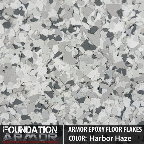 Frosted noir Armor Epoxy Floor Flakes with textured appearance, showing a decorative epoxy floor coating with black and gray flakes.