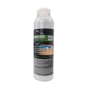 Foundation Armor Ultra-Fine Non-Slip Additive mixed with concrete, showing a close-up of the additive's fine granules for improved traction.